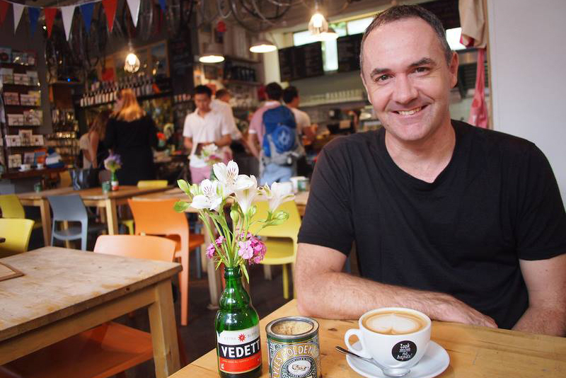 Digital Nomad James Clark At a Cafe in London