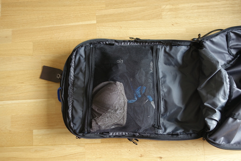 Travel gear packed into main compartment of Minaal Carry-on