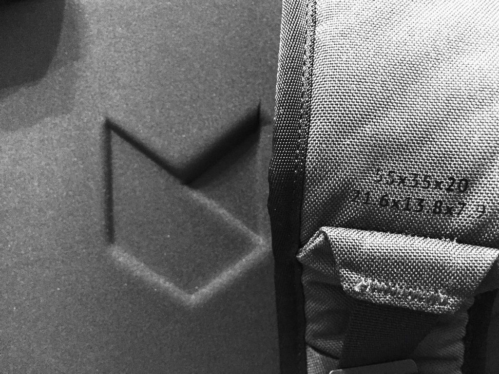 Minaal Carry-on 2.0 travel backpack carry-on bag size dimensions on left shoulder