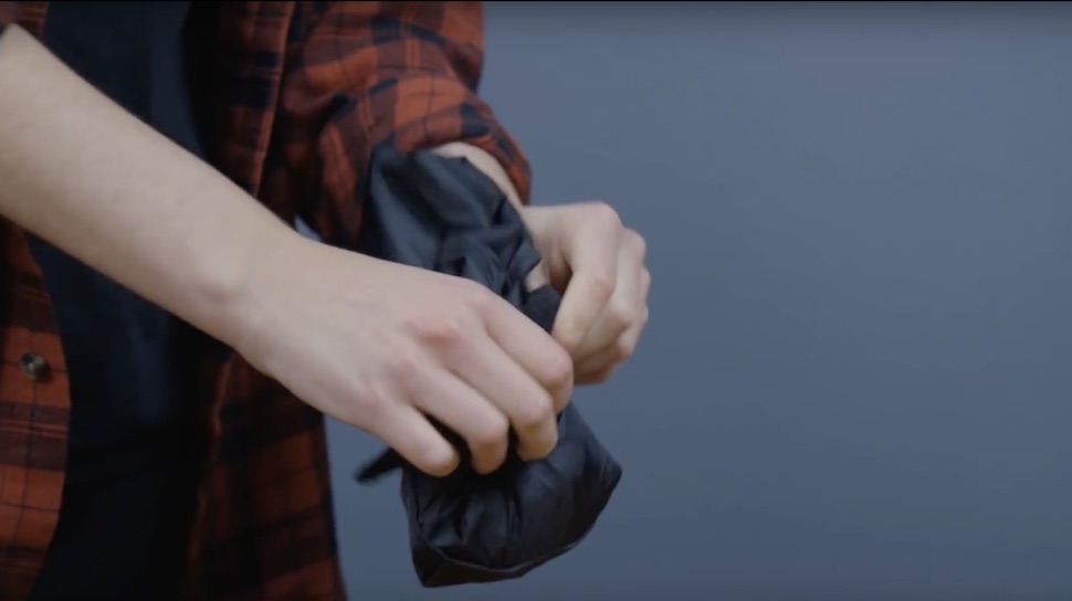 Your Minaal Daily's detachable raincover packs into itself